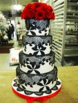 red flowers and black lace cake
